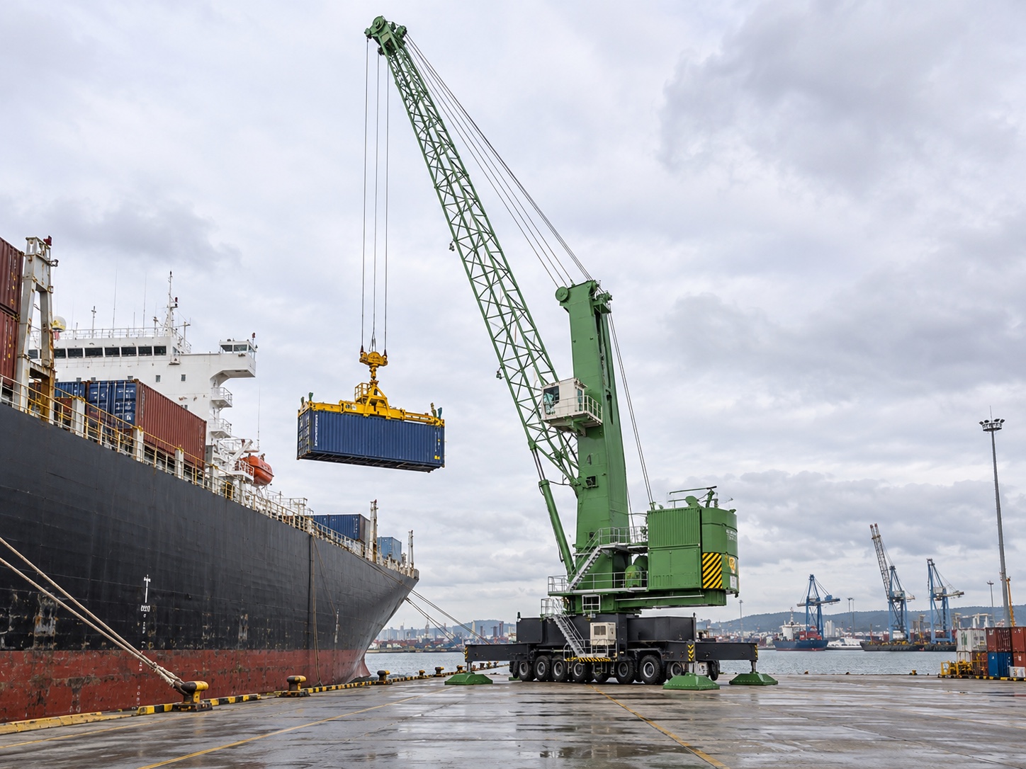 Mobile harbour crane lifting a shipping container beside a cargo ship